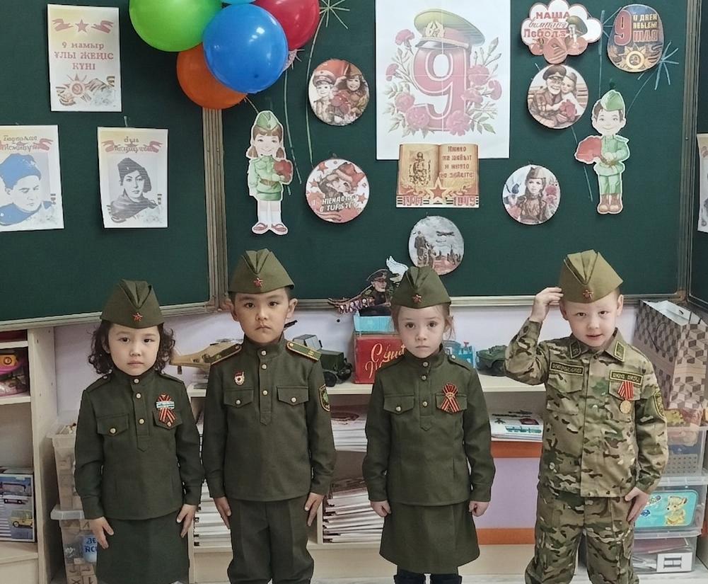 Ортаңғы «Күншуақ» тобындағы тақырыптық ұйымдастырылған іс-әрекет. Тақырыбы: «7 мамыр – Отан қорғаушылар күні»/      Тематическое ОД в средней группе "Күншуақ" Тема: "7 мая День Защитника Отечества".